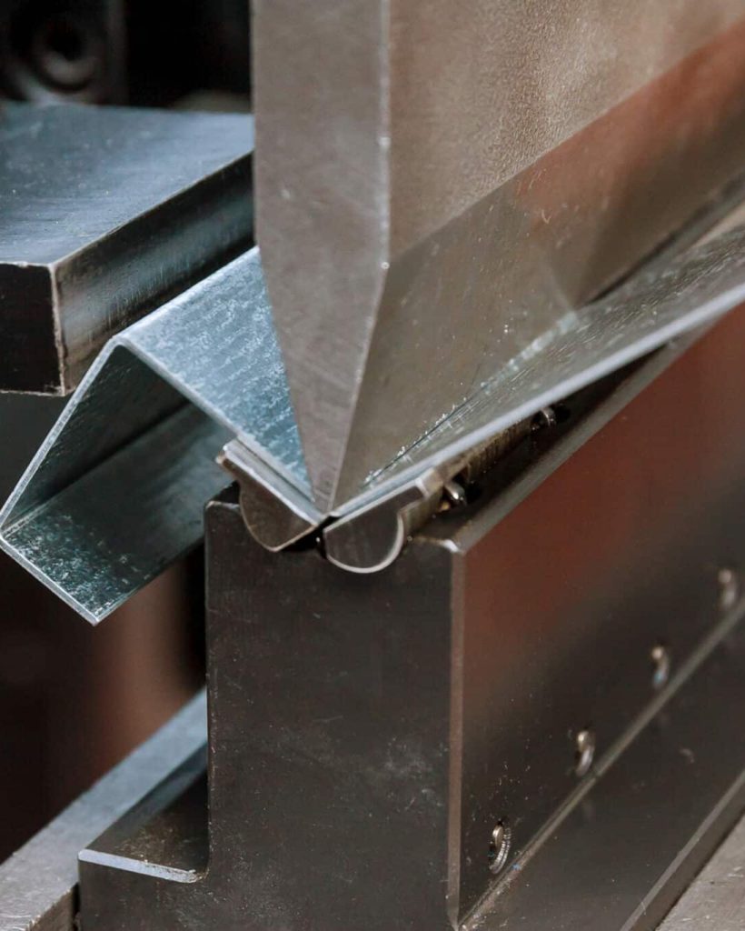Working with sheet metal and special bending machines. hydraulic press brake or bending machine for sheet metal.